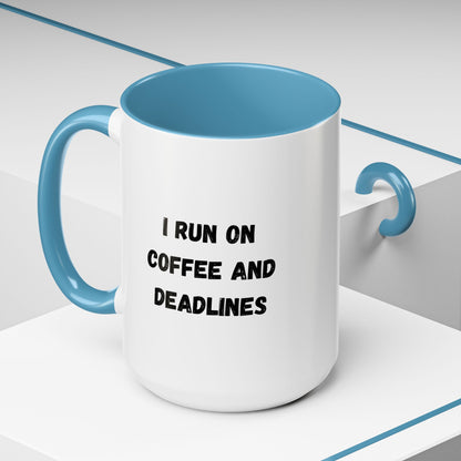 White ceramic coffee mug with black text reading "I run on coffee and deadlines" from Printify, shown with a close-up view.