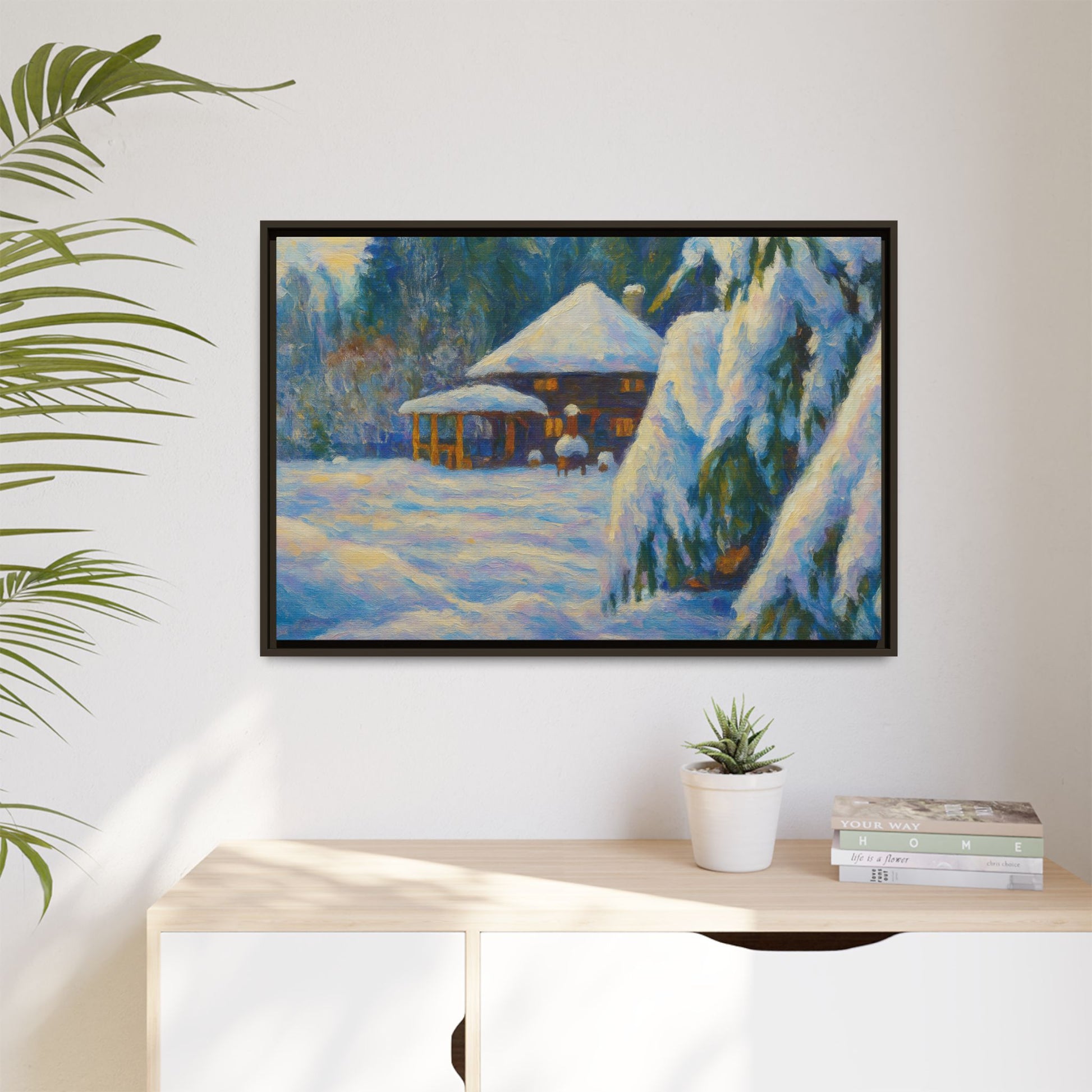 Framed matte canvas wall art of a snowy cabin winter landscape, featuring a cozy cabin amid snow-covered trees.