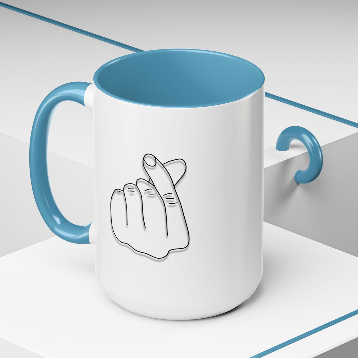 Minimal Korean finger heart accent mug by Printify, 11oz or 15oz ceramic coffee mug with simple heart design, white background.