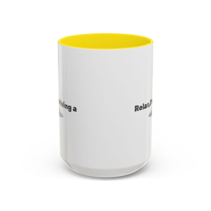 Ceramic coffee mug with "Relax, I’m Driving" UFO design, 11 oz, featuring colorful alien and spacecraft illustrations.