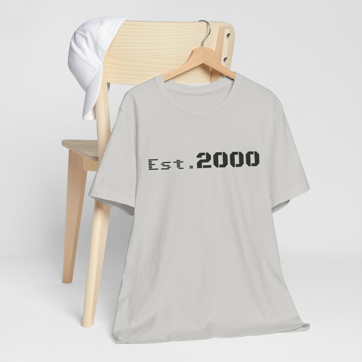 Retro Pixel T-Shirt by Printify featuring "Born in 2000" design, vintage style, and pixel art graphics on front.