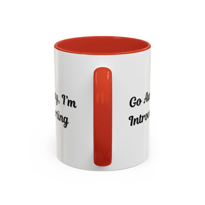 Ceramic coffee mug with "Go Away, I'm Introverting" message in black text, 11 oz size, ideal for introverts.