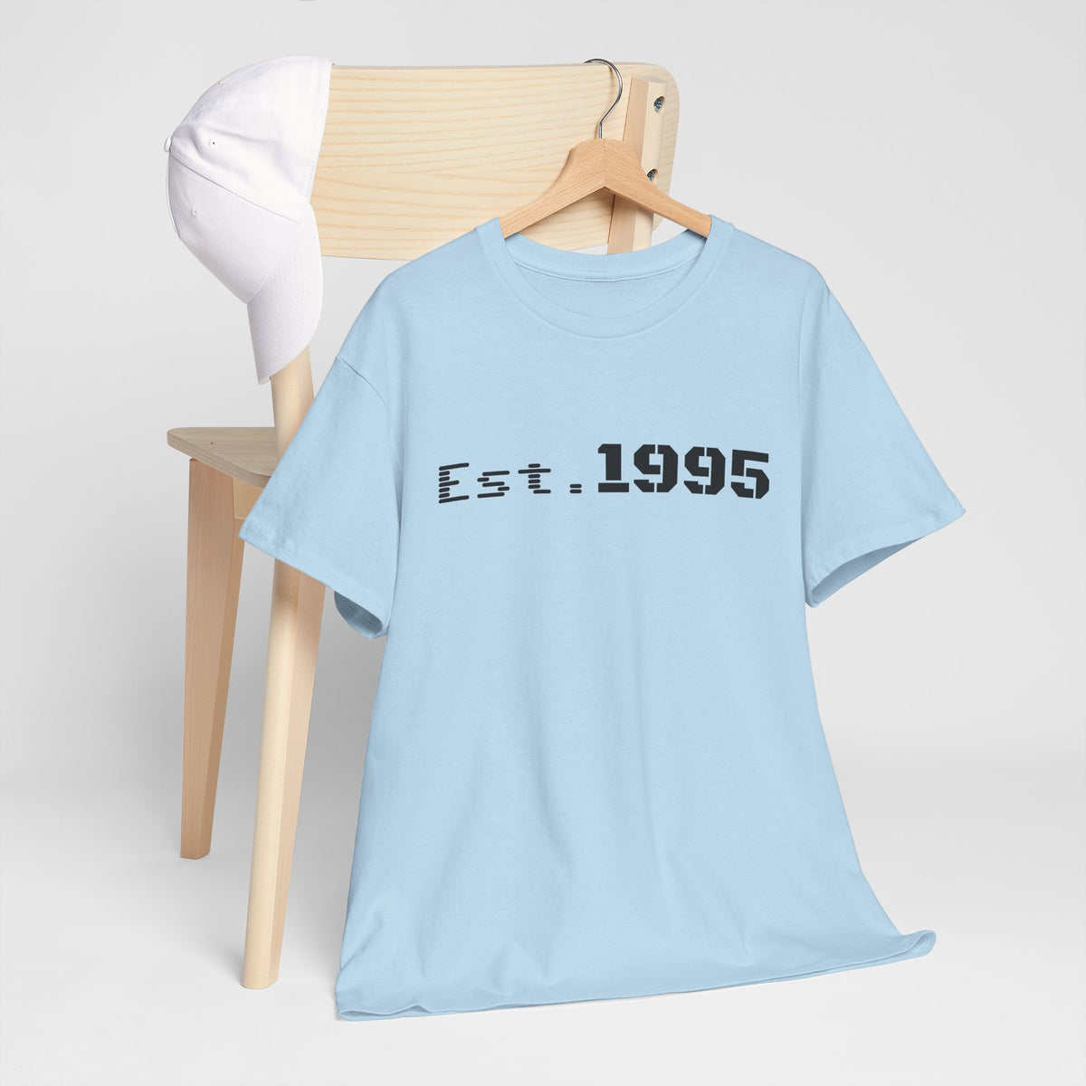 Vintage minimalist Est. 1995 T-shirt by Printify featuring a clean design celebrating the birth year 1995.