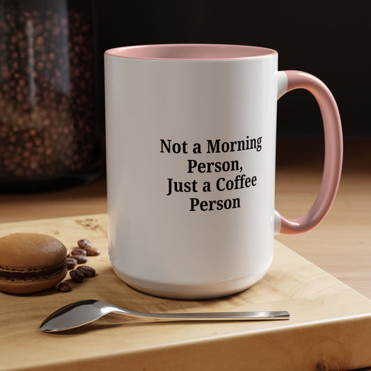 Ceramic coffee mug with "Not a Morning Person, Just a Coffee Person" text, printed by Printify, featuring a white handle and graphic design.