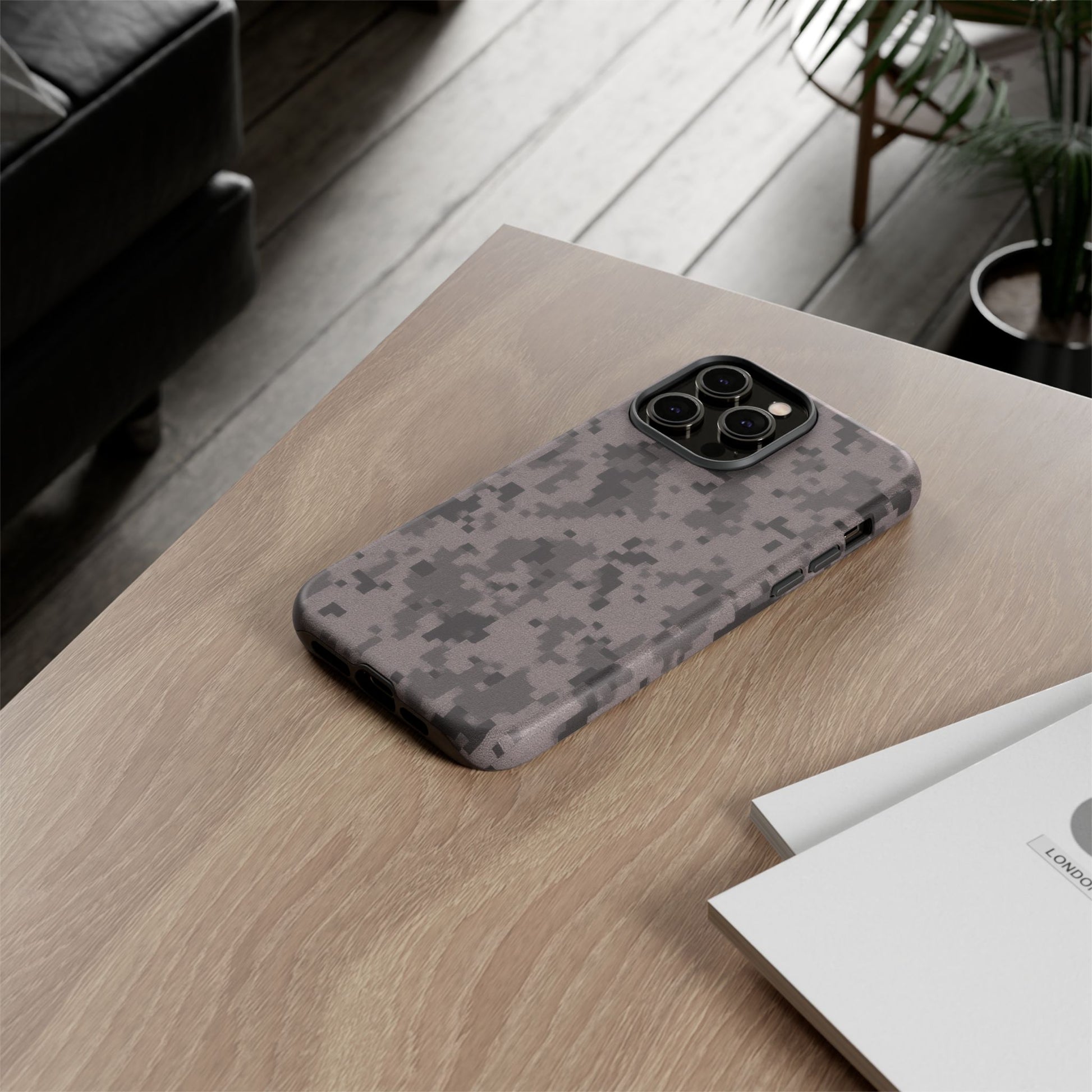 Gray digital camouflage phone case by Printify, tough protective cover for smartphones with a rugged camouflage design.
