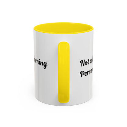 Ceramic "Not a Morning Person" coffee mug in 11oz or 15oz size with black handle and print, ideal for morning coffee.