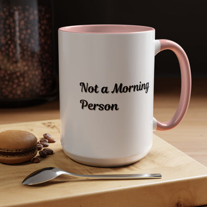 Ceramic coffee mug with "Not a Morning Person" print, 11oz size, by Printify, featuring a white mug with black text.