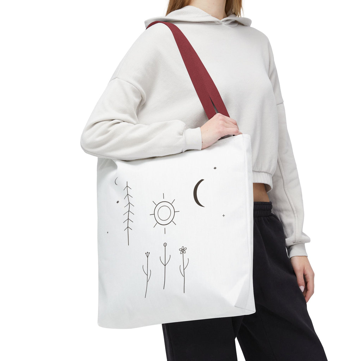 Minimal Moon and Sun botanical tote bag featuring celestial line art, eco-friendly fabric, and stylish design by Printify.