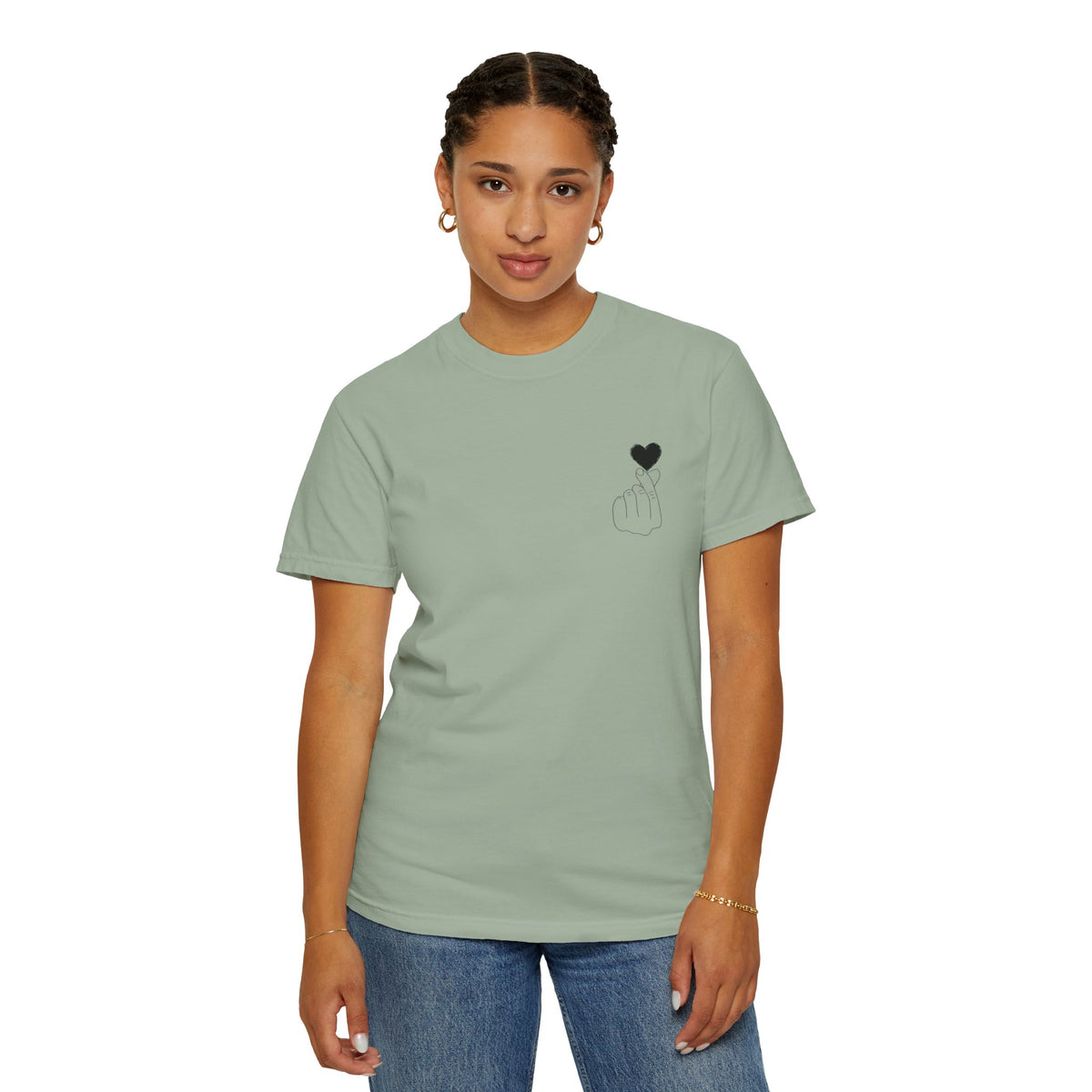 Black T-shirt with a minimal white finger heart graphic, designed for casual wear by Printify.
