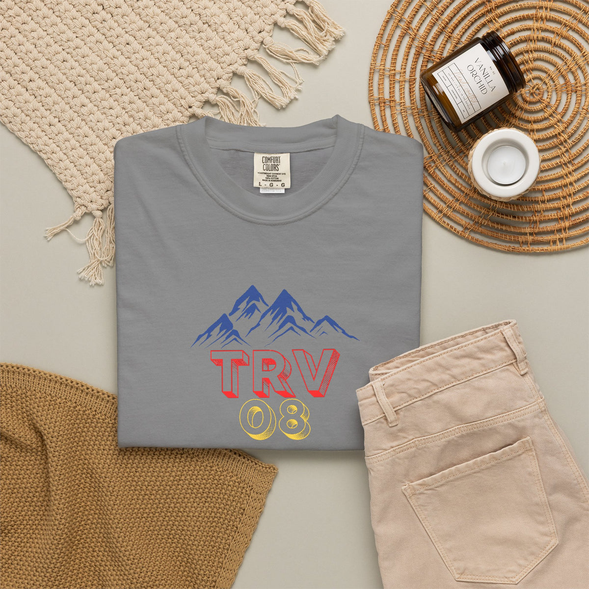 Unisex garment-dyed T-shirt with TRV08 Logo print by Printify, soft cotton fabric, casual fit, light blue color, front view.