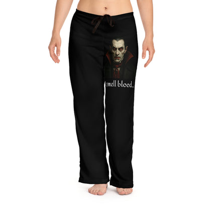 Women's vampire-themed sleep pants with "I Smell Blood" print, all-over blood splatter design, comfortable pajama bottoms by Printify.