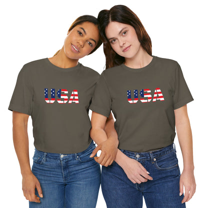 Red, white, and blue USA flag text T-shirt by Printify featuring patriotic Fourth of July design and casual fit.
