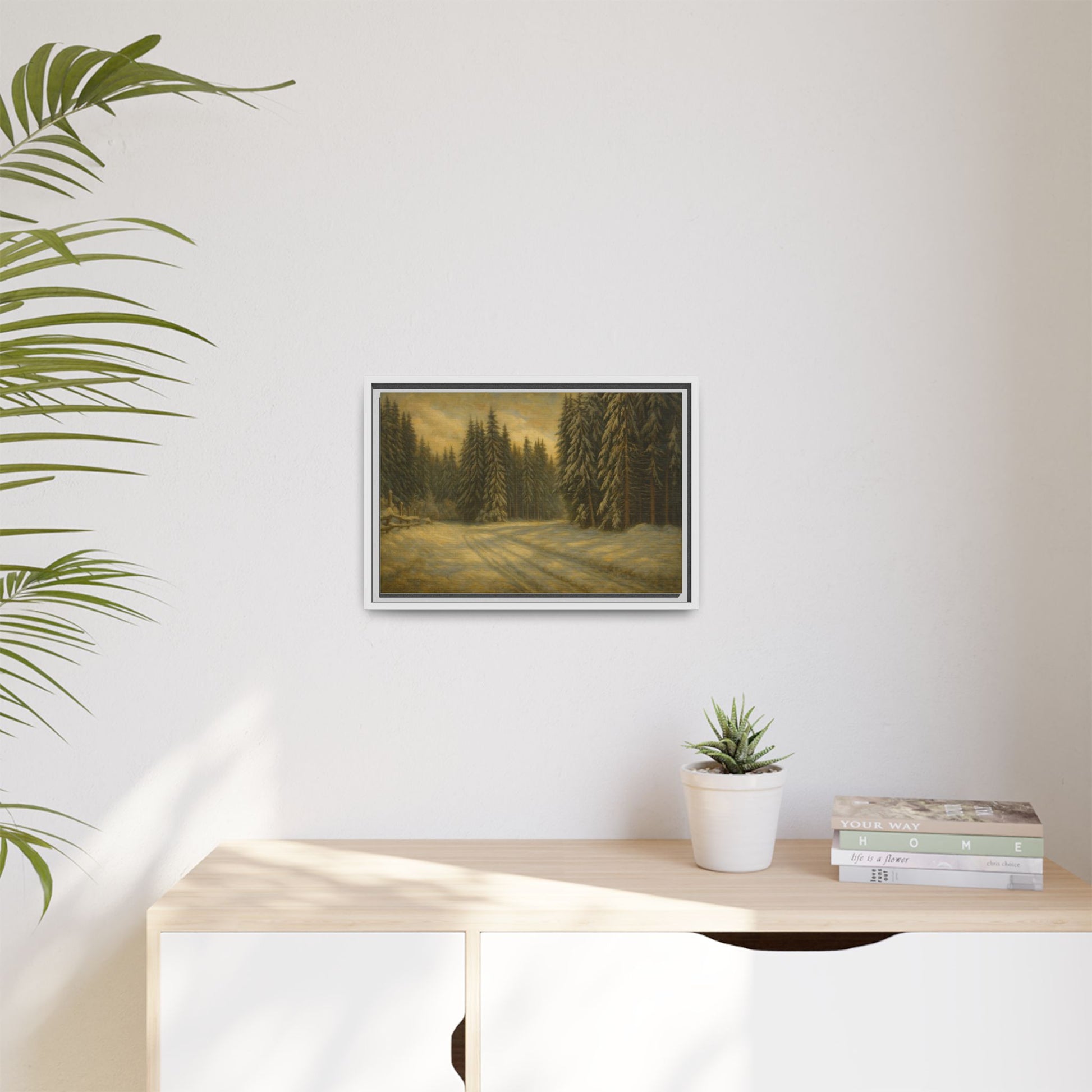 Framed matte canvas wall art featuring a winter forest landscape with trees and snow, by Printify.