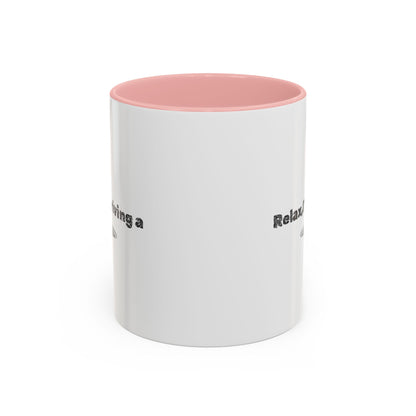 Ceramic coffee mug with "Relax, I’m Driving" UFO accent design in 11 oz size, featuring a colorful extraterrestrial theme.