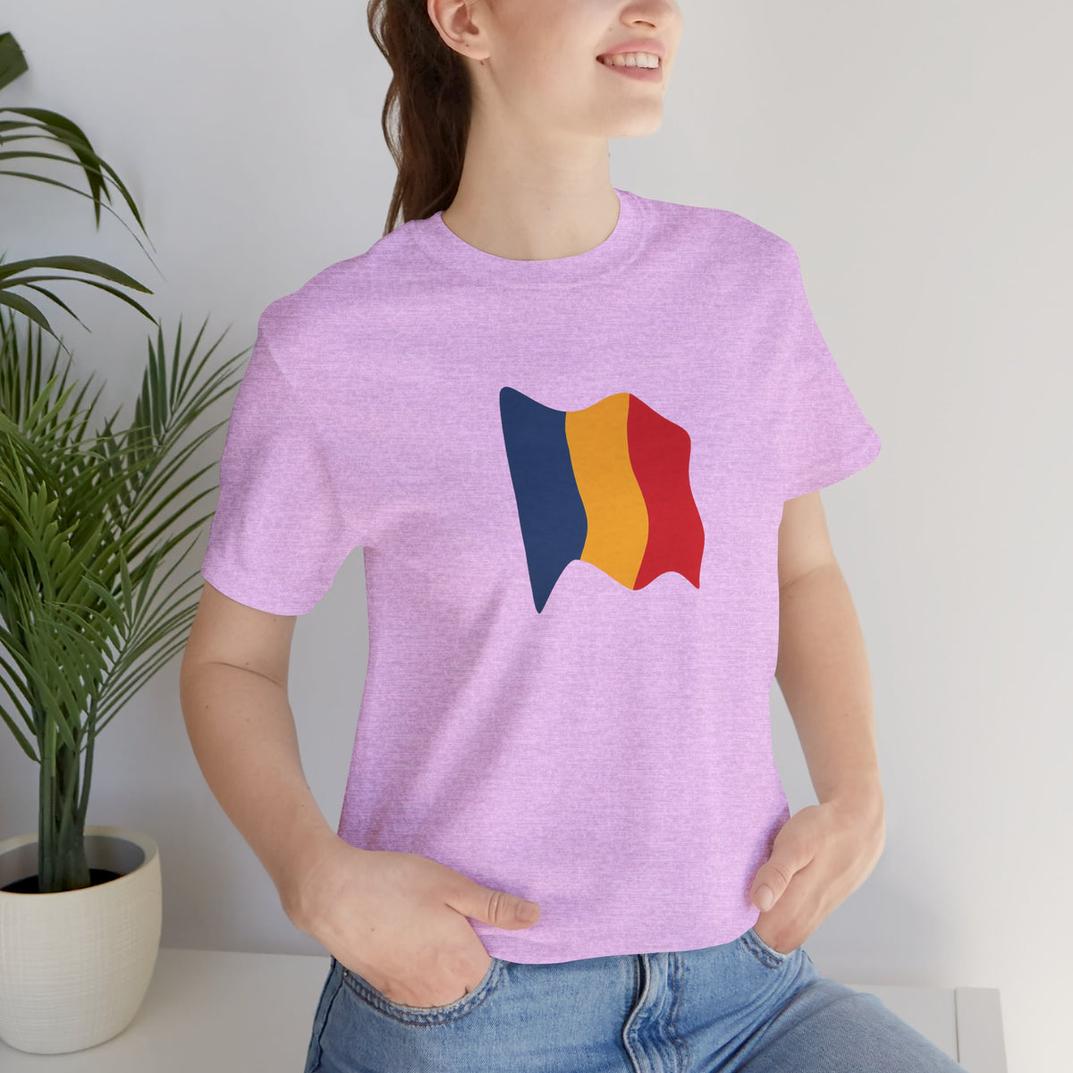 Romania flag T-shirt by Printify, minimal waving tricolor design, soft fabric, casual fit, showcasing the Romanian national flag.