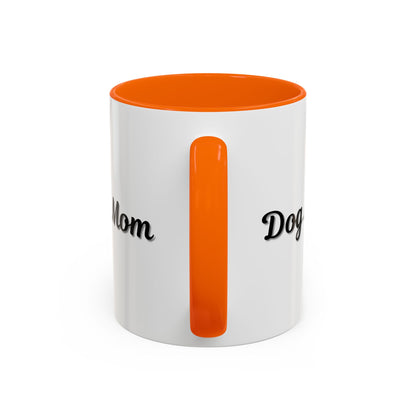 Dog Mom Accent Coffee Mug — white ceramic coffee mug with retro script "Dog Mom" print, colored interior and C-handle, 11oz/15oz, styled lifestyle product photo