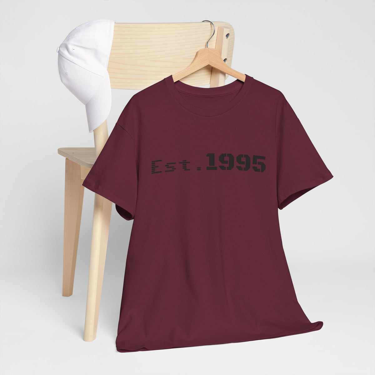 Vintage Est. 1995 T-shirt by Printify featuring minimalist design and "Born in 1995" birthday print on a casual tee.