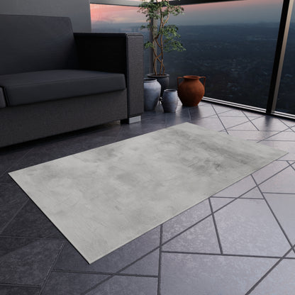 Modern gray outdoor rug by Printify, featuring durable indoor-outdoor flooring design for patios and decks.