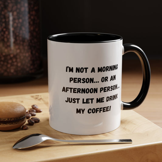 White ceramic mug with "I'm Not a Morning Person" printed in black, perfect for night owls and humorous gift-giving.