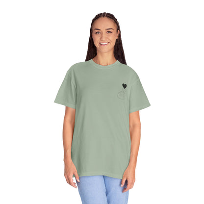 Black T-shirt with a minimal finger heart graphic, designed by Printify, featuring a sleek and simple heart illustration.