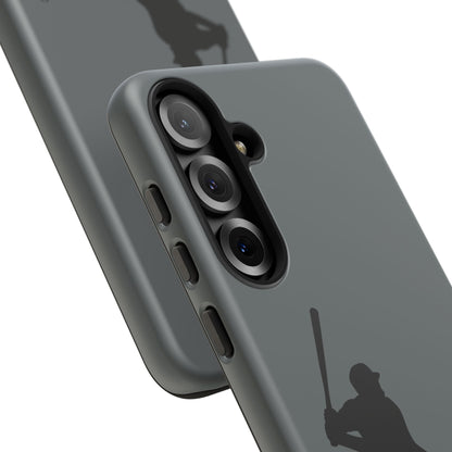 Black phone case with baseball silhouette design for iPhone, protective and sporty Printify Tough Phone Case on a white background.