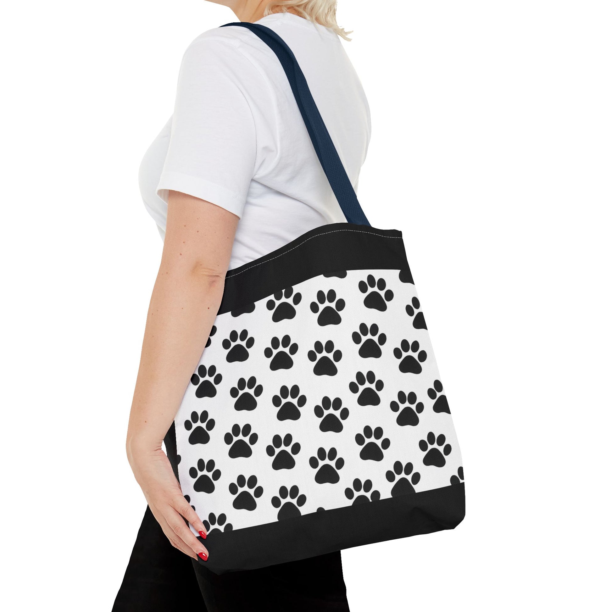 Eco-friendly tote bag with paw print design from Printify, perfect for dog and cat lovers to carry belongings.