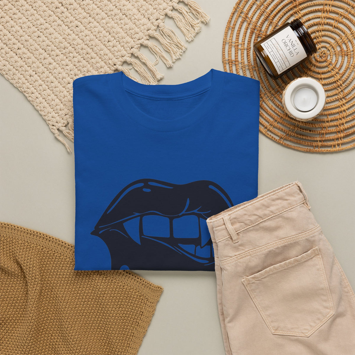 Black graphic T-shirt by Printify featuring dripping lips with "hmm..." bite design on the front.