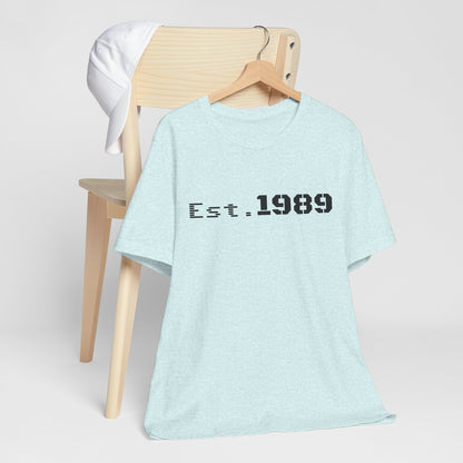 Vintage Est. 1989 graphic T-shirt by Printify featuring a retro design celebrating the year born.