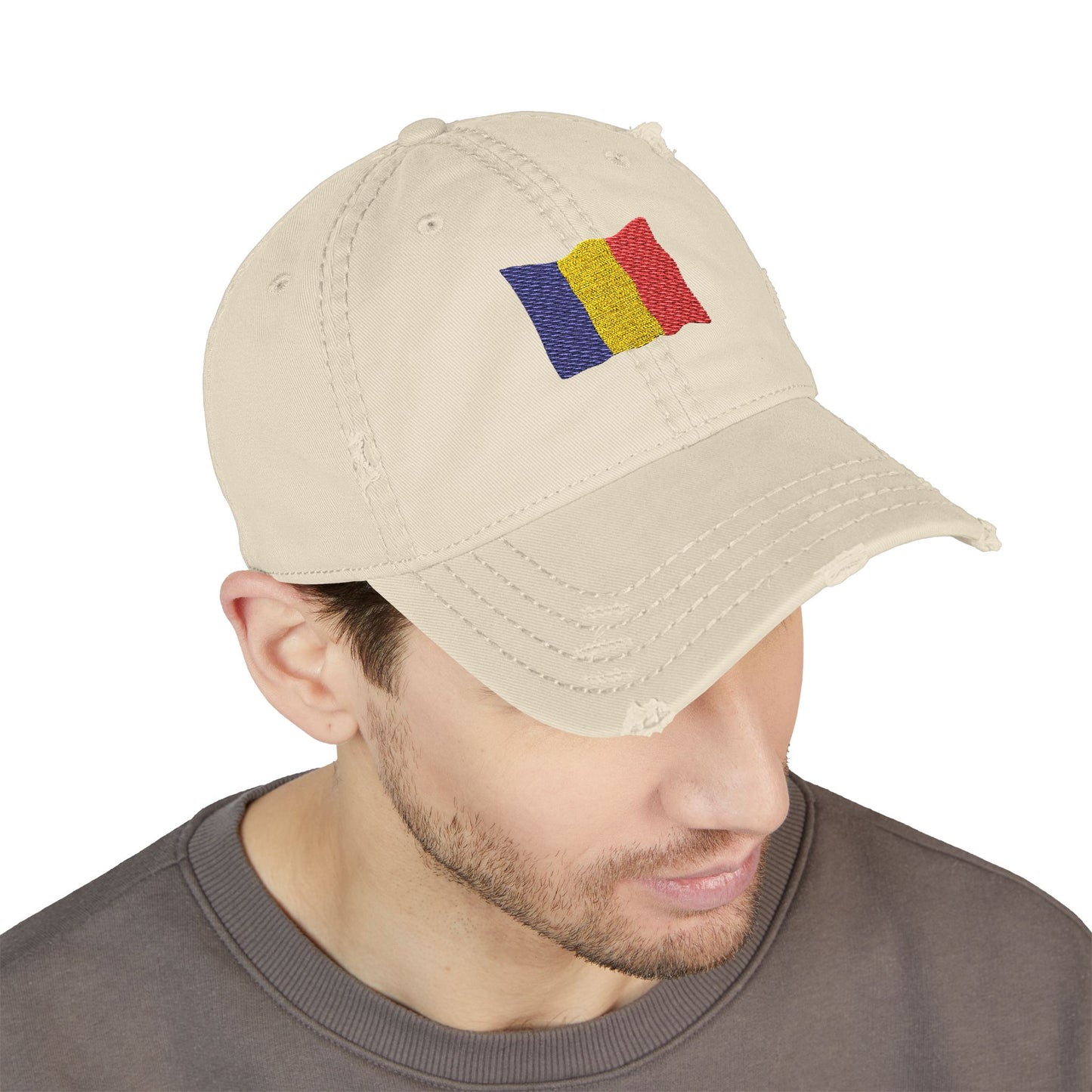 Distressed embroidered dad hat featuring Romanian flag patch, stylish casual hat by Printify.