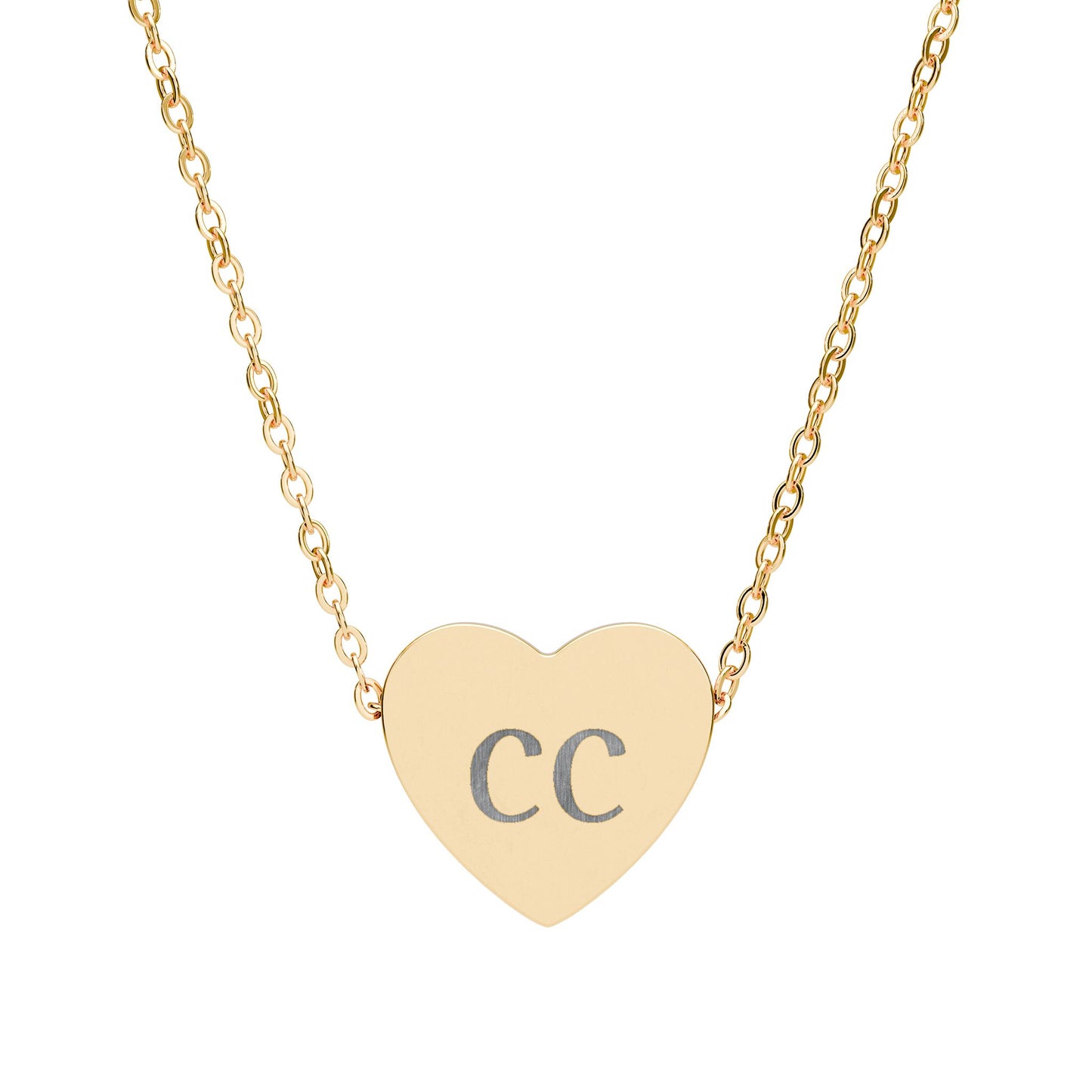Personalized engraved heart necklace with initials pendant, silver-tone jewelry, stylish accessories for women.