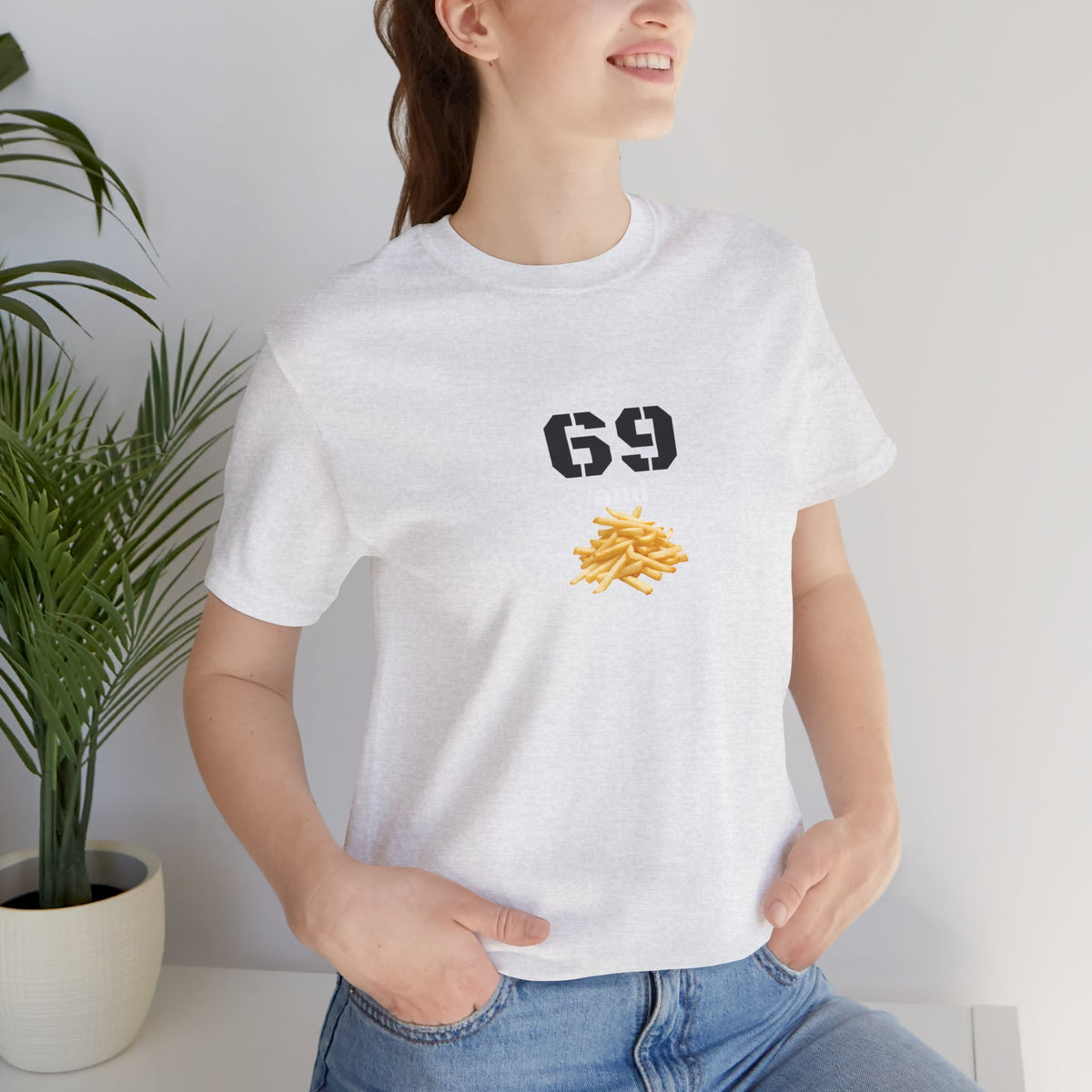 Unisex graphic T-shirt featuring a humorous 69 and French fries design, printed by Printify, casual and quirky fashion.