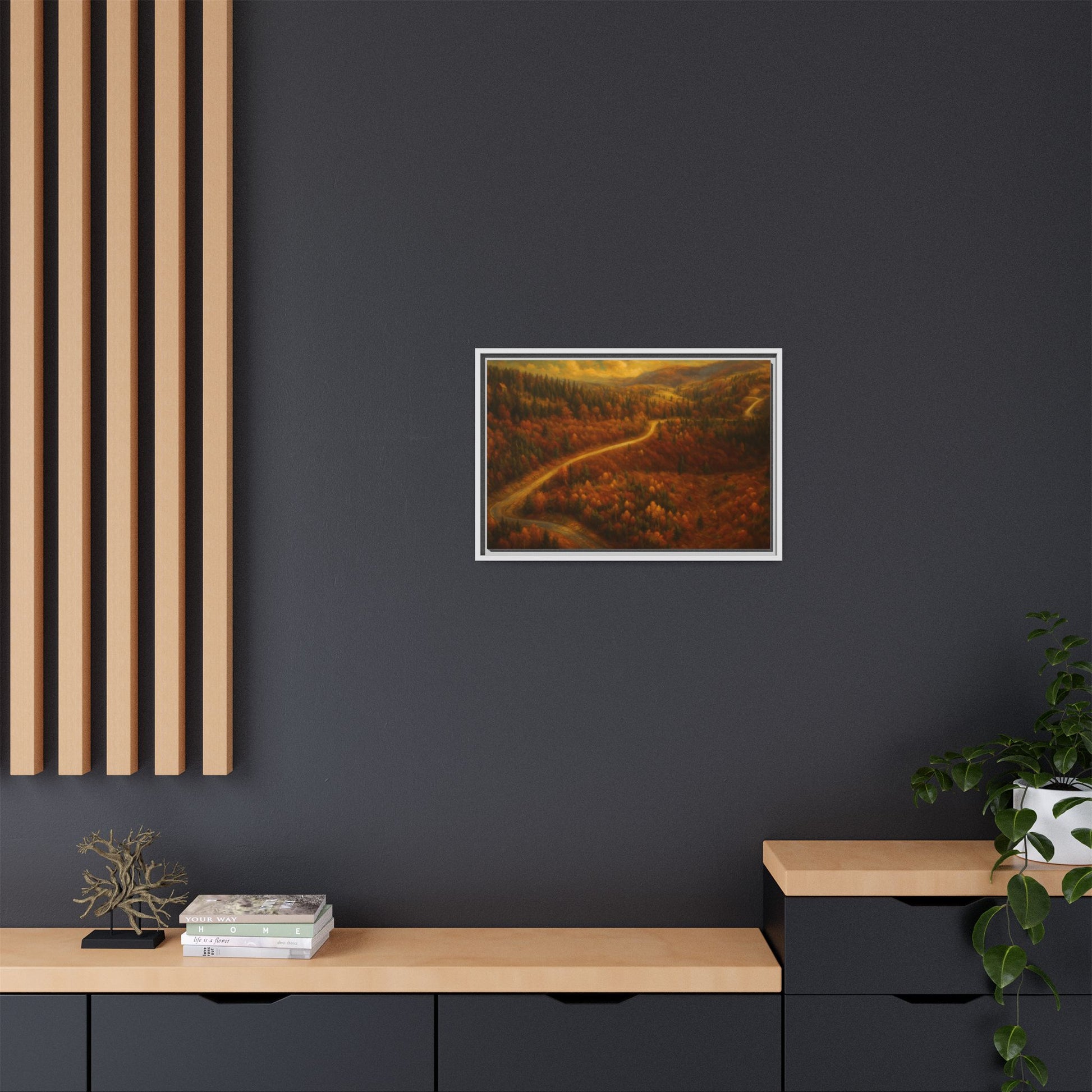 Framed matte canvas print of an autumn forest road landscape wall art by Printify, showcasing vibrant fall trees and a scenic pathway.
