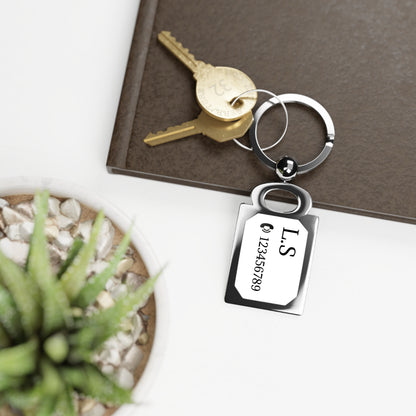 Engraved rectangle photo keyring accessory with personalized photo display, featuring a metal keyring and custom engraved design.