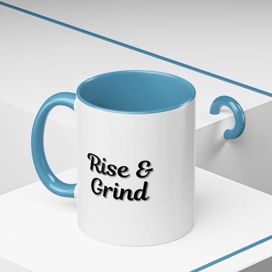 Black "Rise & Grind" coffee mug with white text, ceramic mug perfect for coffee lovers and morning motivation.
