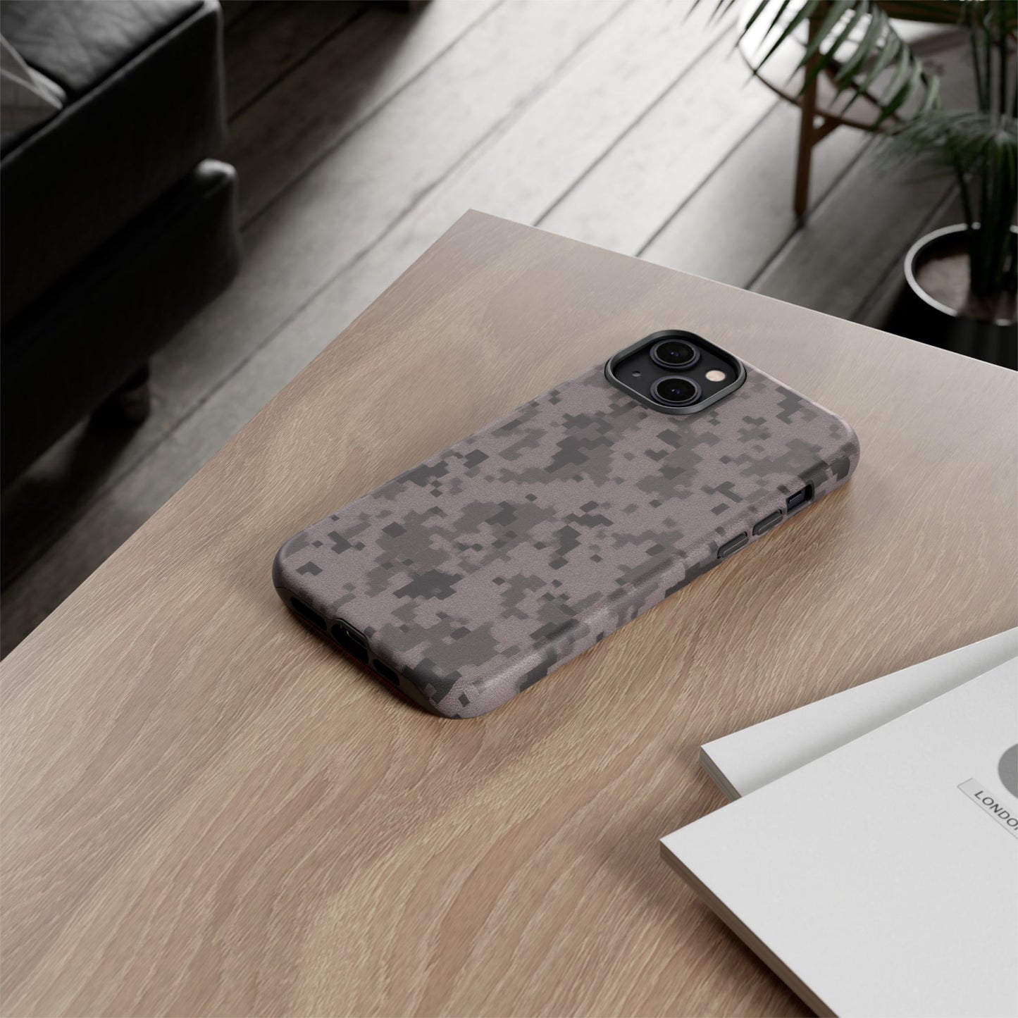 Gray digital camouflage phone case by Printify, tough protective cover designed for a secure fit and durable protection.