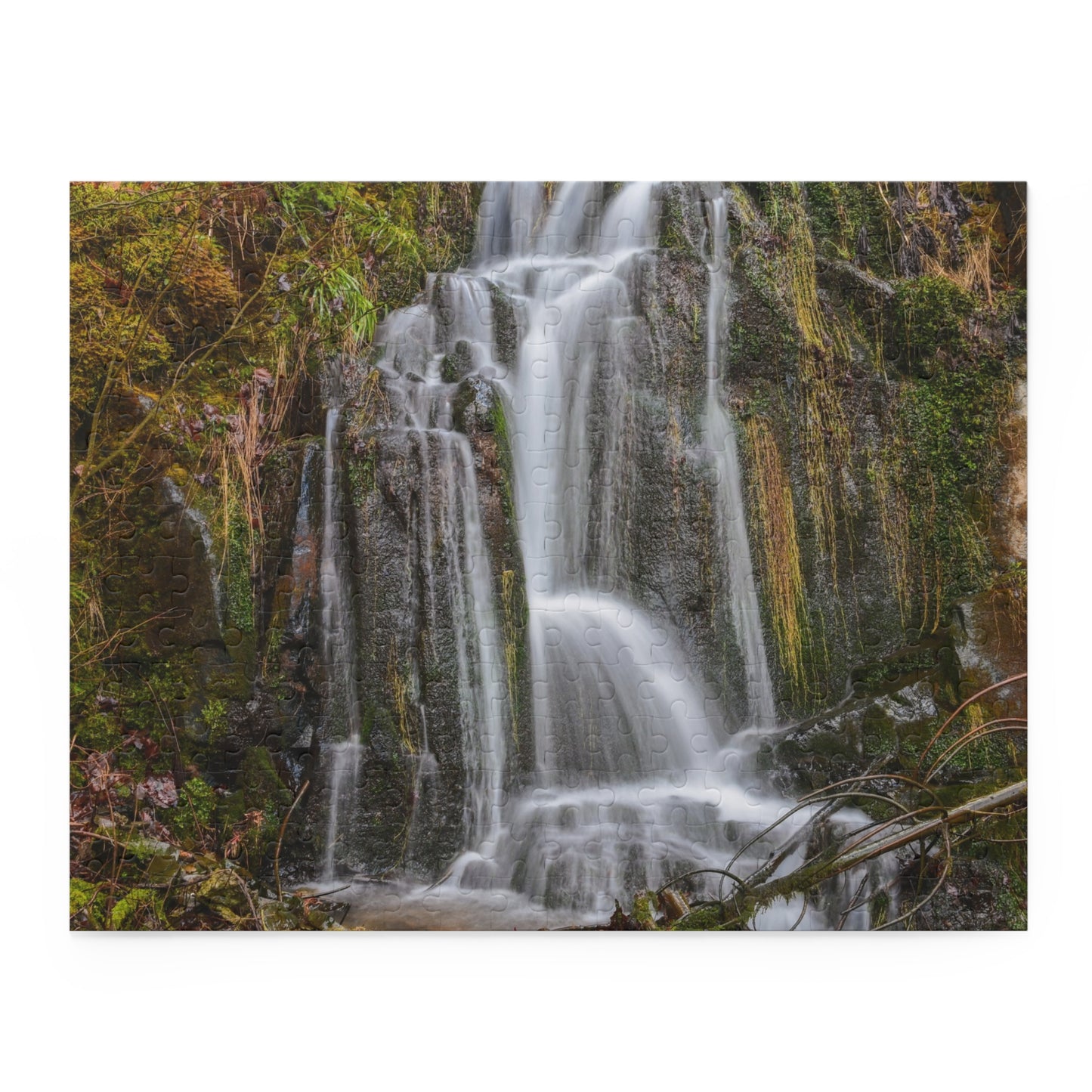 Colorful Mossy Waterfall puzzle by Printify featuring detailed waterfall and lush mossy scenery, ready for assembly.