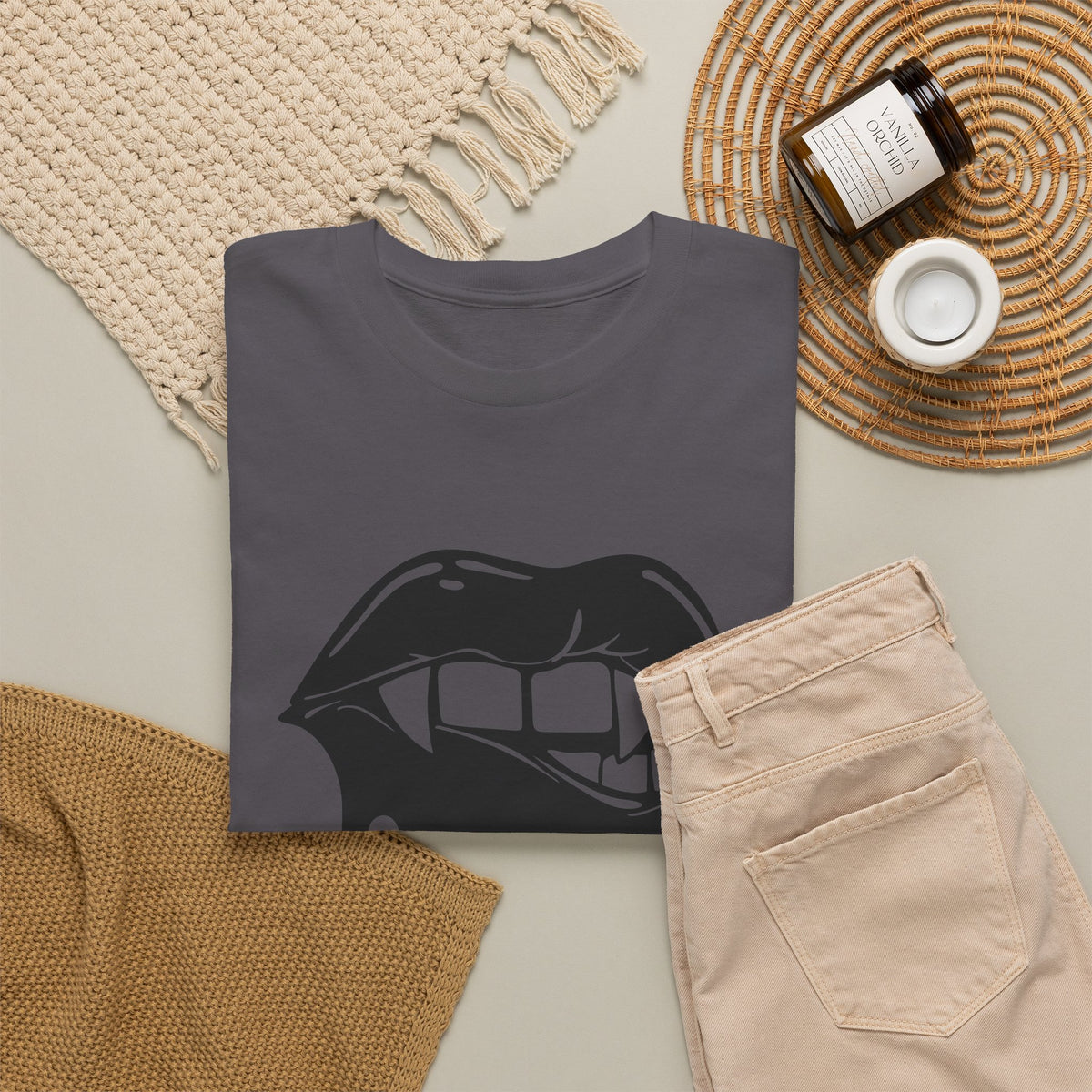 Graphic T-shirt featuring dripping lips with 'hmm...' bite design in black and white print, by Printify.