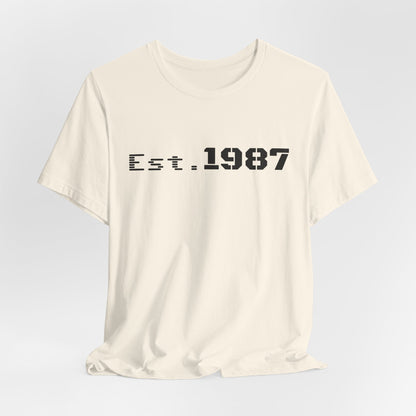 Vintage Est. 1987 T-Shirt by Printify featuring a classic born 1987 design on a casual cotton tee.