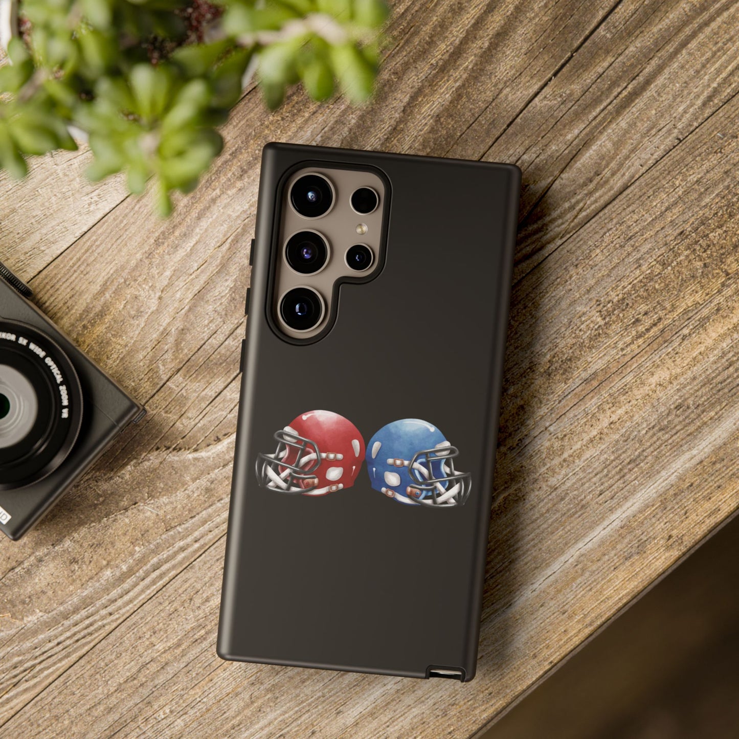 Red and blue football helmet tough phone case for iPhone, protective Printify phone cover with sports helmet design.