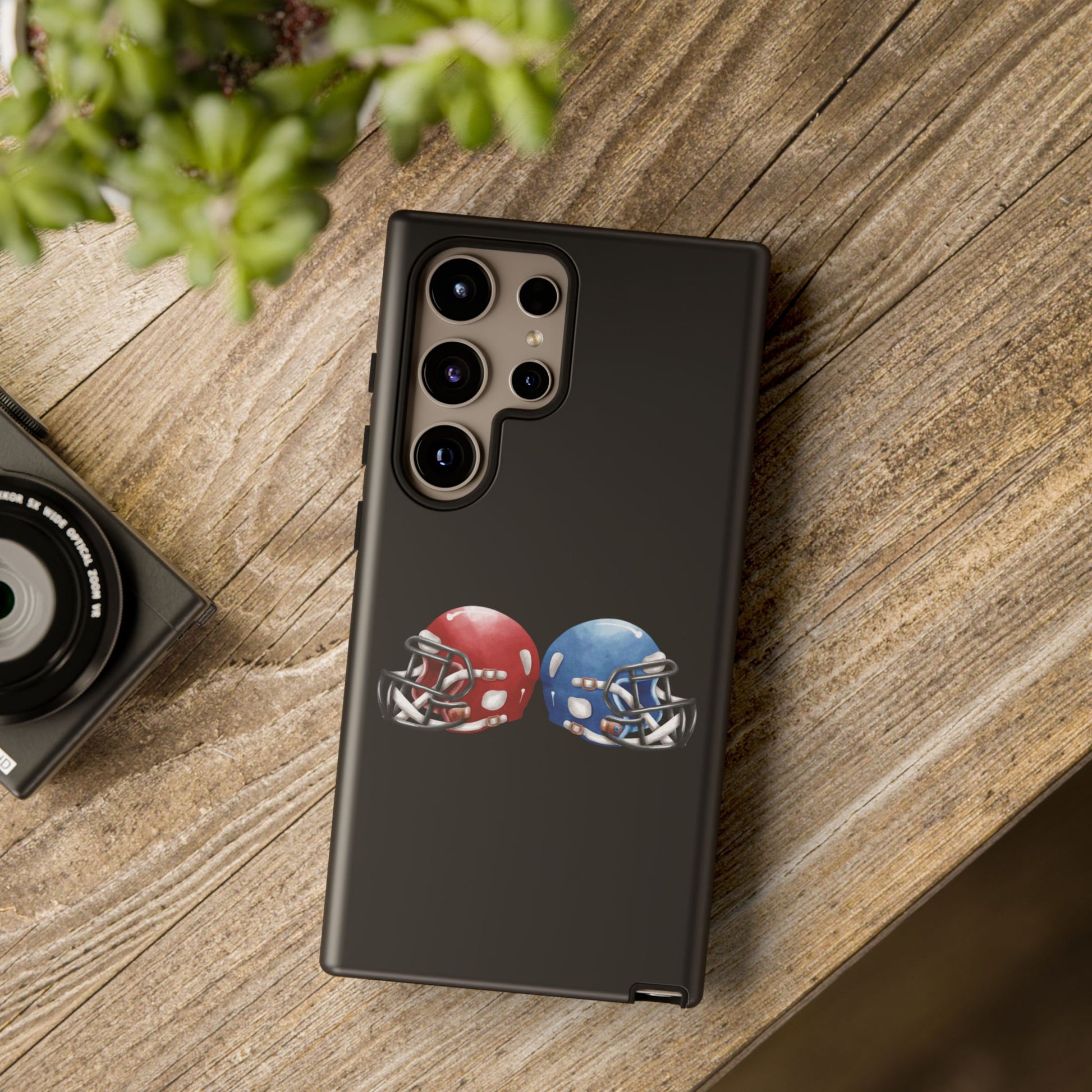 Red and blue football helmet tough phone case for iPhone, protective Printify phone cover with sports helmet design.