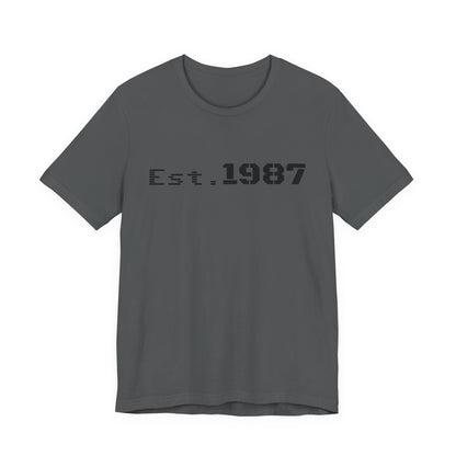 Vintage Est. 1987 T-Shirt from Printify featuring classic Born 1987 design on a comfortable fabric tee.