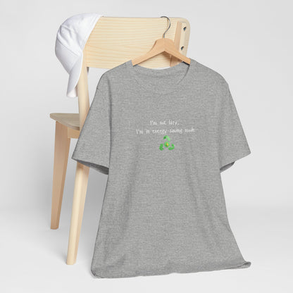 Eco-friendly mock T-shirt with humorous "I’m Not Lazy, I’m an Energy-Saving Mock" print, casual fit, Printify brand.