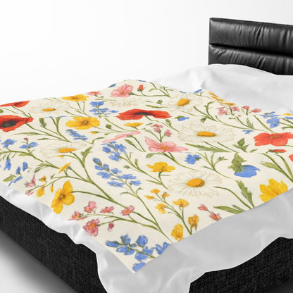 Velvet plush blanket with all-over poppy daisy floral print, Wildflower Meadow design by Printify.