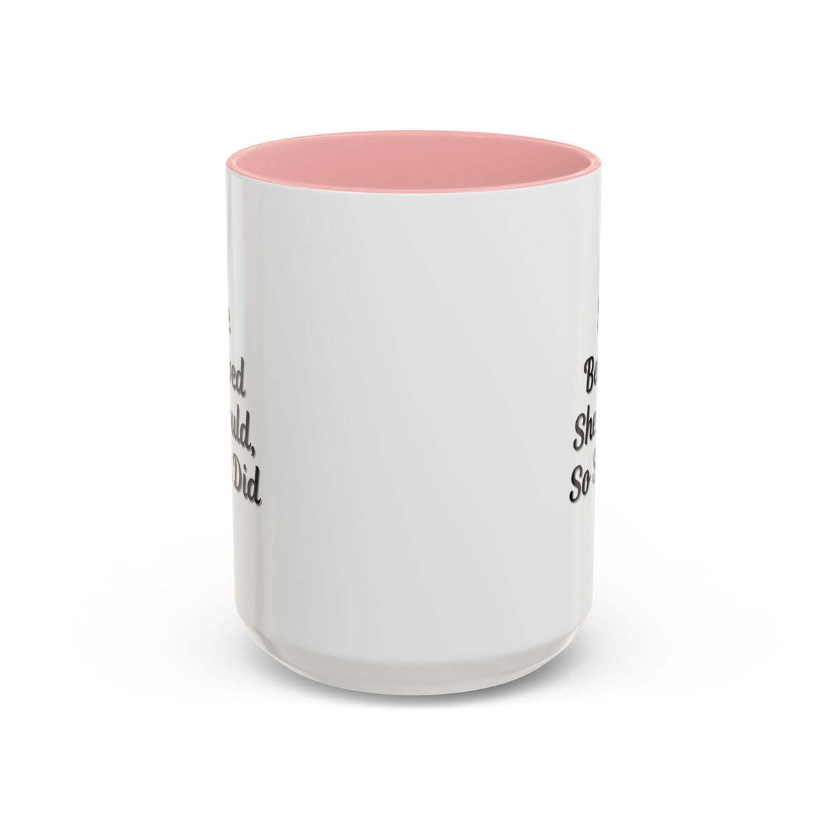 Motivational coffee mug with the quote "She Believed She Could, So She Did" in black text on a white ceramic mug.