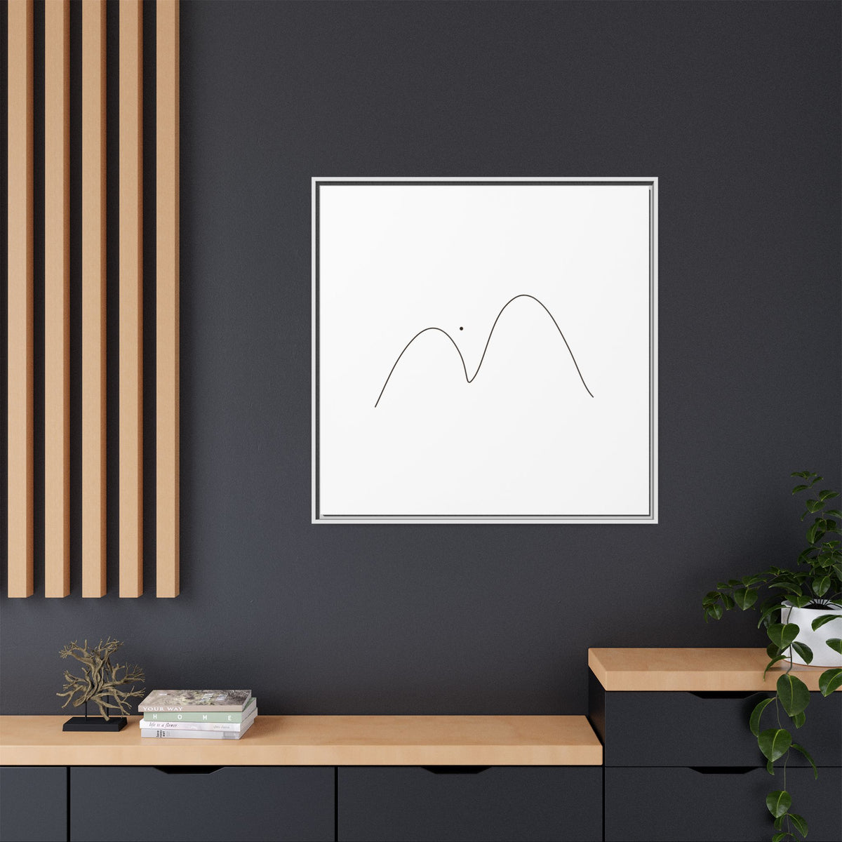 Framed minimalist mountain line art on matte canvas, modern wall decor by Printify, featuring simple mountain outlines in black.