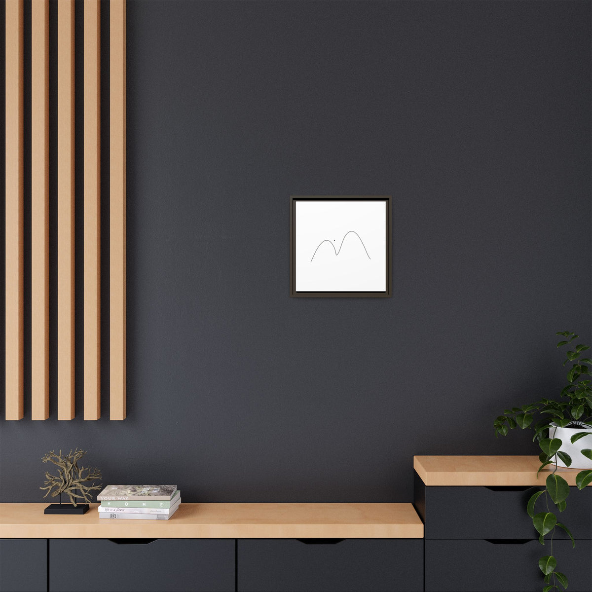 Minimalist mountain line art framed matte canvas by Printify featuring simple mountain design on a sleek white background.