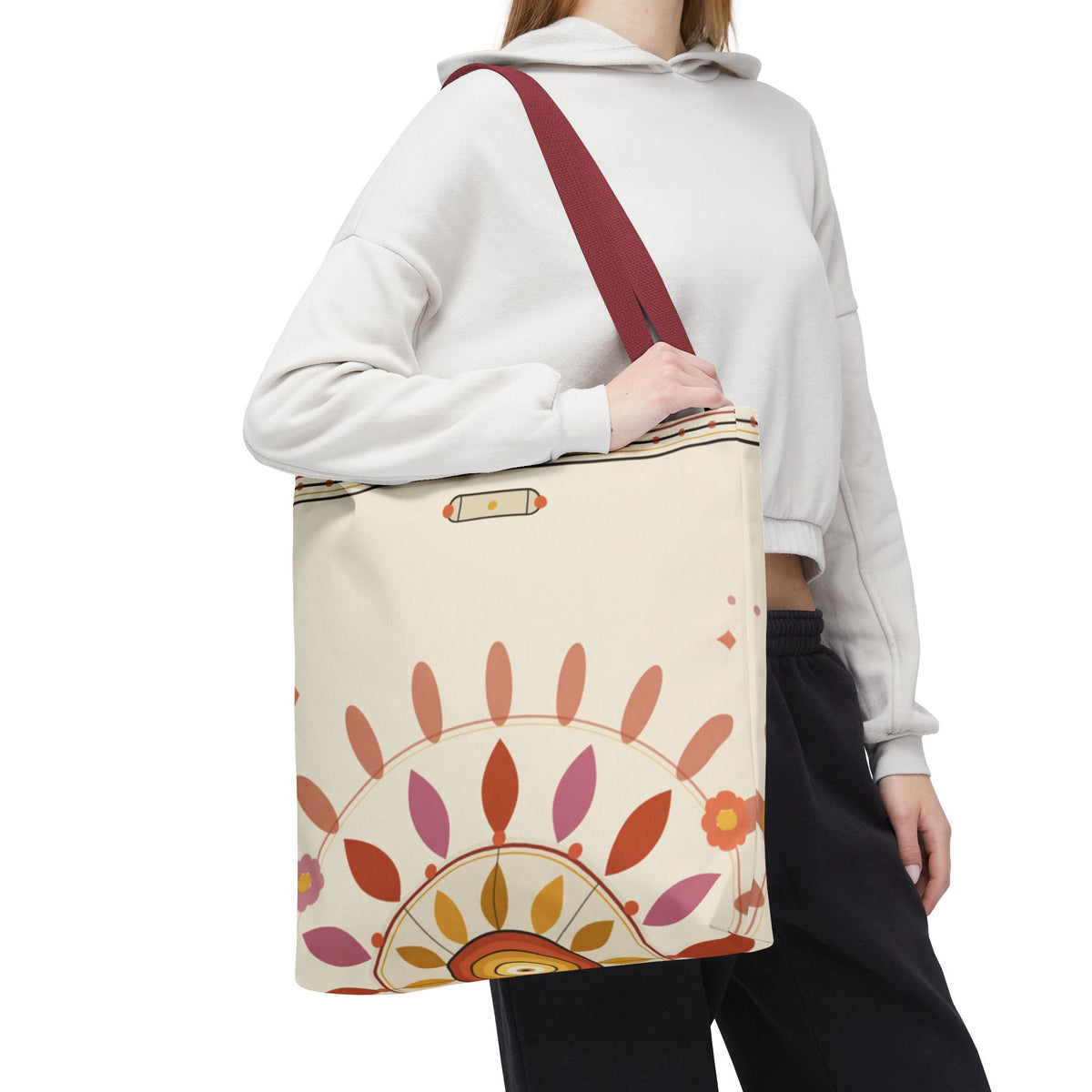 Boho floral mandala tote bag with pastel sunburst pattern, featuring a colorful, artistic design on a canvas bag.