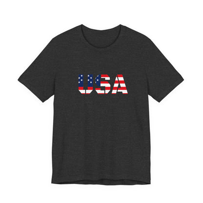 USA flag text T-shirt by Printify featuring patriotic Fourth of July design on a casual cotton T-shirt.