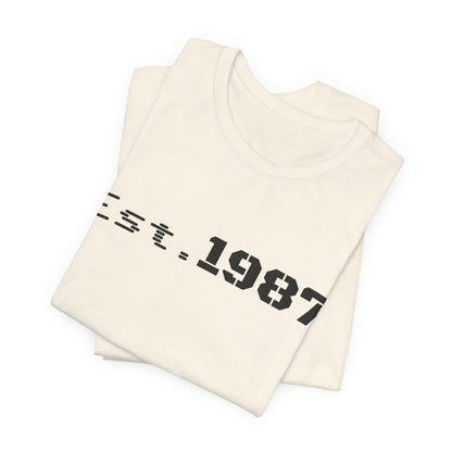 Vintage Est. 1987 T-Shirt by Printify featuring classic born 1987 design on a casual cotton tee.