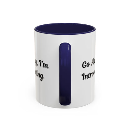 Ceramic coffee mug with "Go Away, I'm Introverting" text, 11 oz, designed for introverts, from Printify.